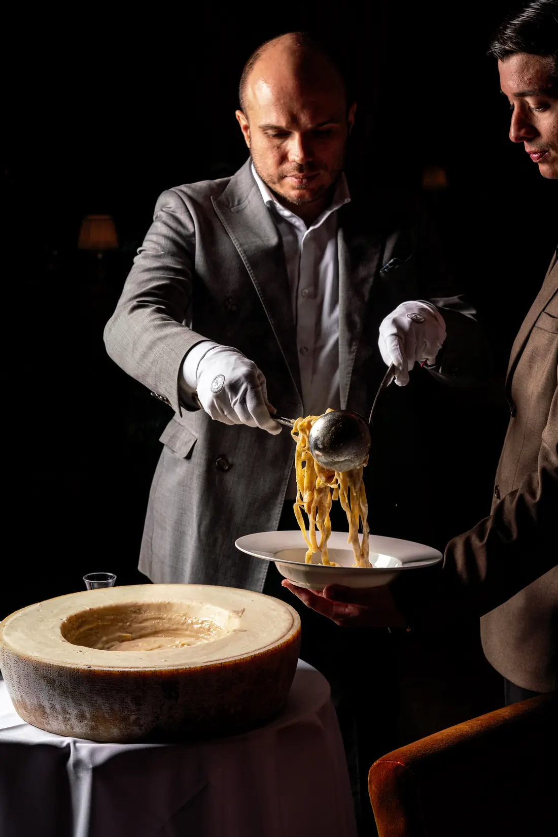 Tableside Parmigiano wheel service at Leonardo